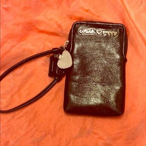 Coach “Poppy” small wristlet. Perfect condition.